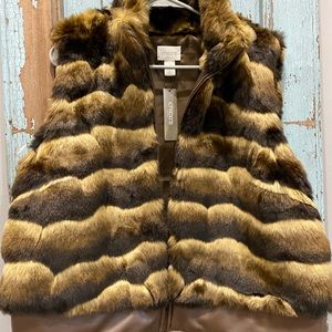 Chico’s NWT faux fur vest. 3. Large